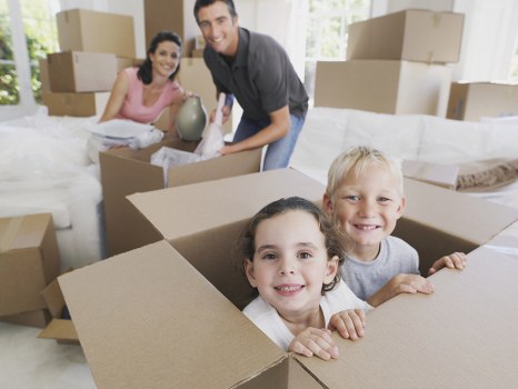Professional removals and storage service preparing boxes in Oldoakcommon