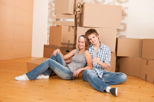 Professional house removals in Oldoakcommon with moving boxes and furniture