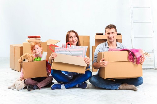Local movers handling furniture during house removals in Oldoakcommon